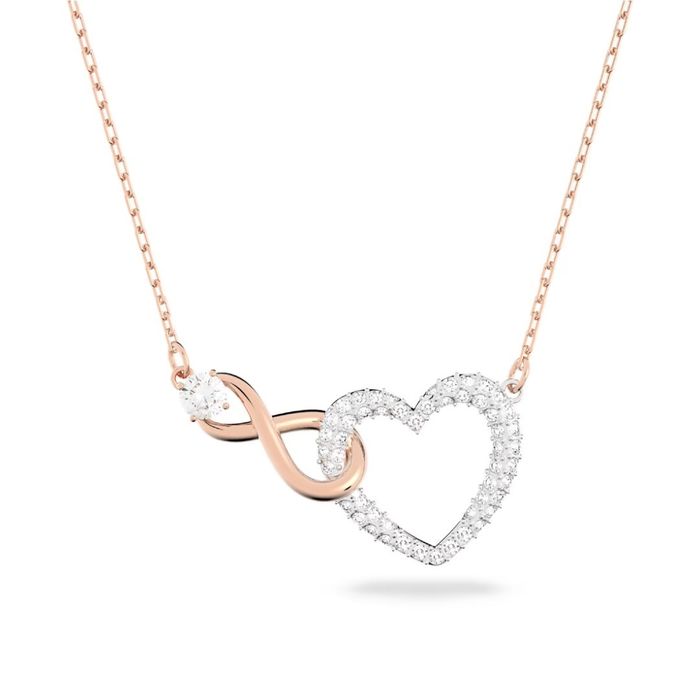 Colar rose gold da Swarovski com um pendente do símbolo inifinito e um coração prateado com pedras.