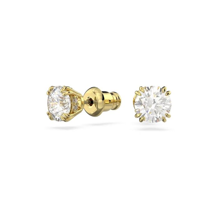 Brincos dourados Swarovski, de frente e lado, com um cristal incolor engastado em garras.