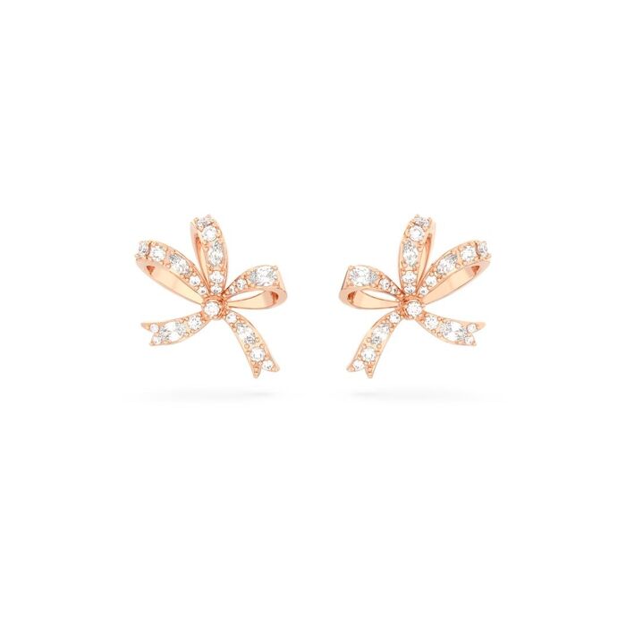 Brincos em rose gold da Swarovski com a forma de um laço cravado de cristais incolores.