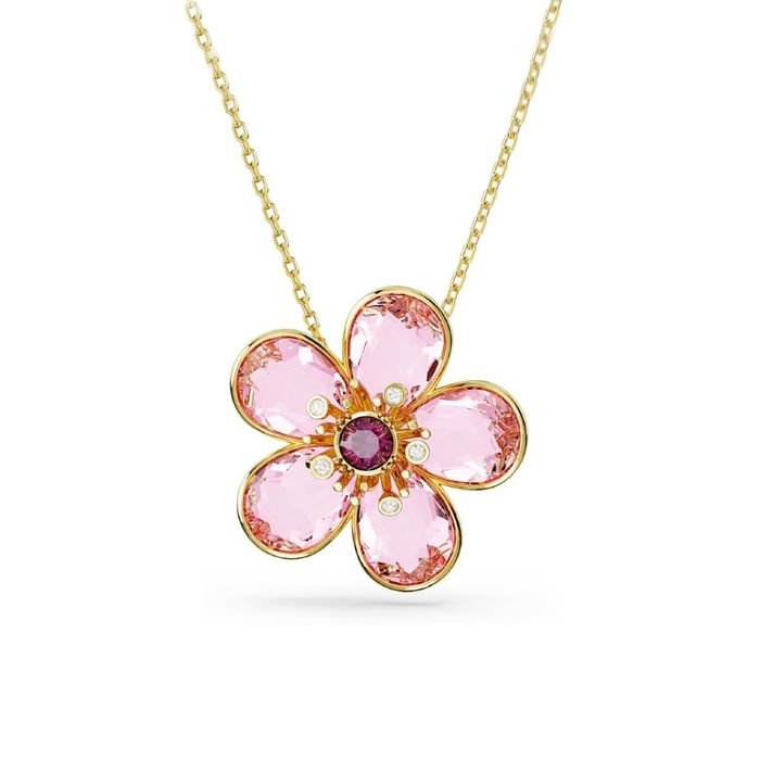 Colar dourado Swarovski com um pendente de uma flor com cristais rosa e uma pedra violeta no centro.