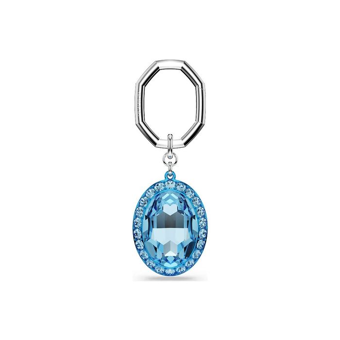 Porta-chaves prateado Swarovski com um pendente com cristais azuis e uma pedra maior no centro.