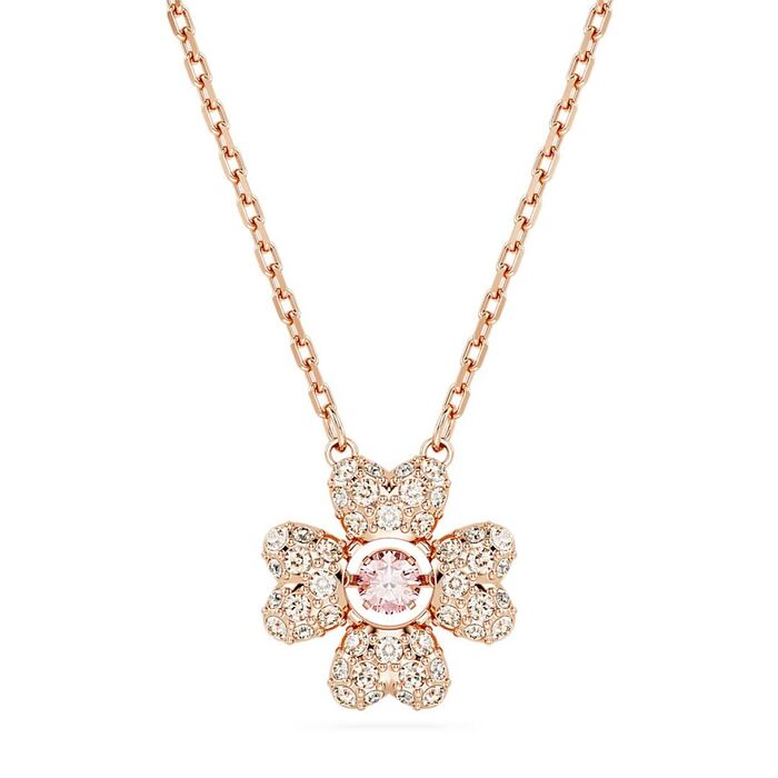 Colar rose gold Swarovski com um pendente em flor cravada de cristais brancos e rosa no centro.