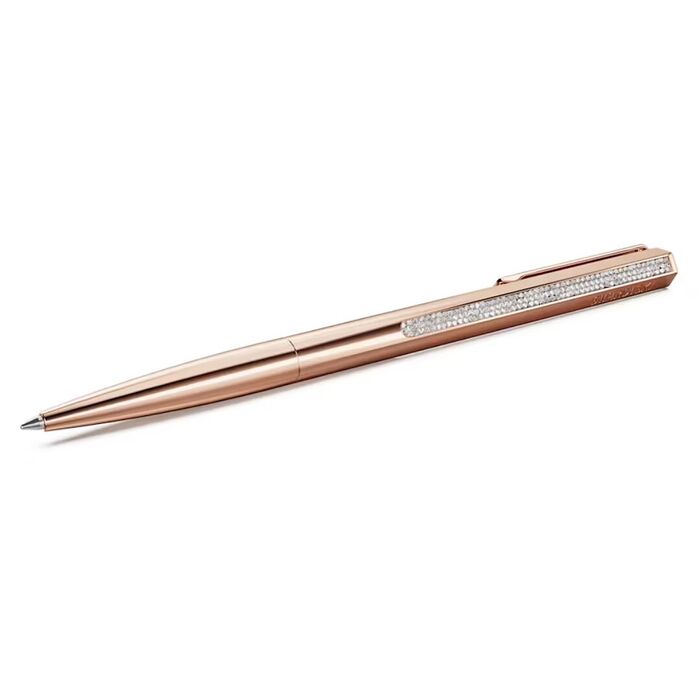 Esferográfica em rose gold da Swarovski com cristais incolores cravados na parte superior.