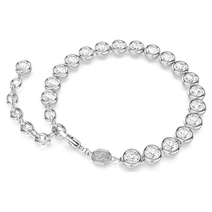 Pulseira prateada da Swarovski com malha de elementos circulares cravados de cristais incolores.