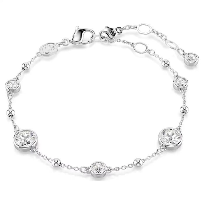 Pulseira Swarovski de malha e elementos circulares prateados com cristais incolores cravados.
