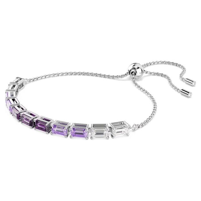 Pulseira Swarovski, em vista de lado, com cristais roxos e incolores e um fecho em bola deslizante.