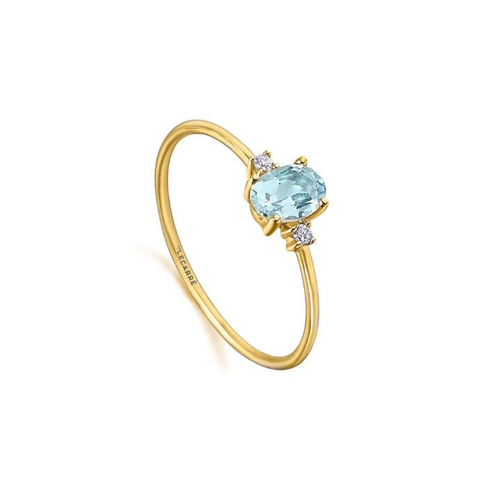 Anel feminino LECARRÉ em ouro amarelo de 18 quilates, com topázio azul e diamantes brancos.
