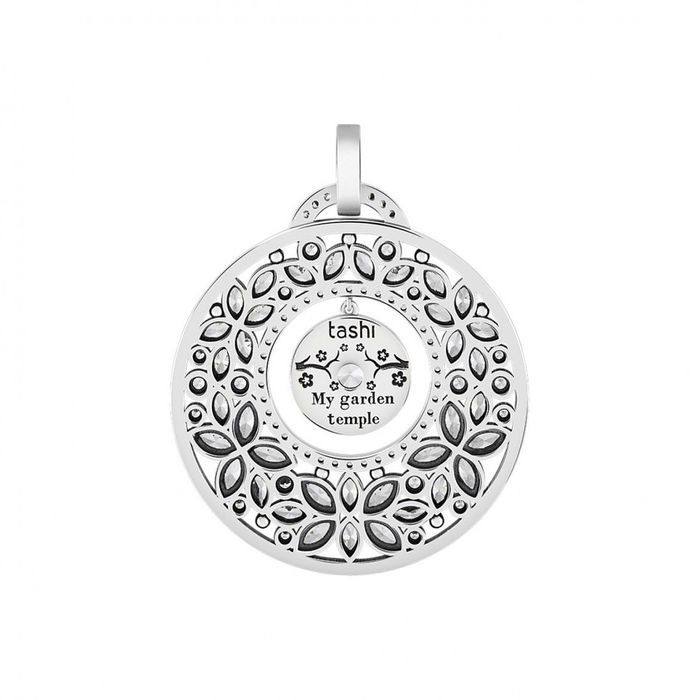 Vista traseira de medalha Tashi com formas florais com pedras e um pendente no centro.