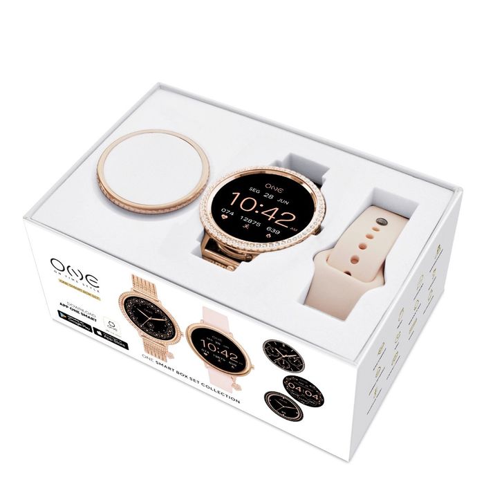 Box com um smartwatch One com uma bracelete em aço e uma em silicone e um bisel rose gold ao lado.