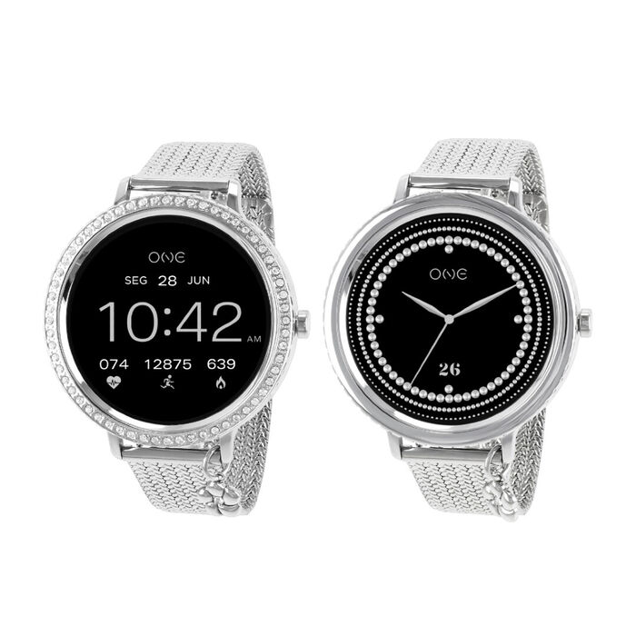 Dois smartwatches One prateados, um com zircónias no bisel, cada um com diferentes imagens no ecrã.