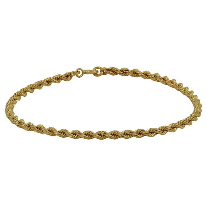 Imagem de pulseira feminina em ouro de dezanove quilates, de tom dourado, de malha tipo corda.