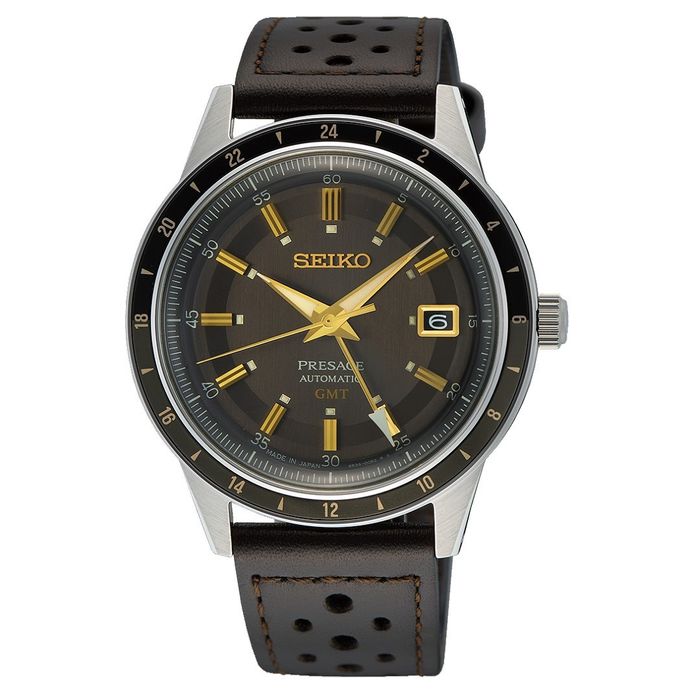 Relógio Seiko Presage de bracelete em couro castanha e caixa prateada, mostrador redondo castanho.