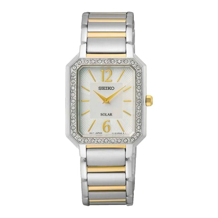 Relógio feminino Seiko de bracelete e caixa prateada, mostrador retangular madrepérola e pedras.
