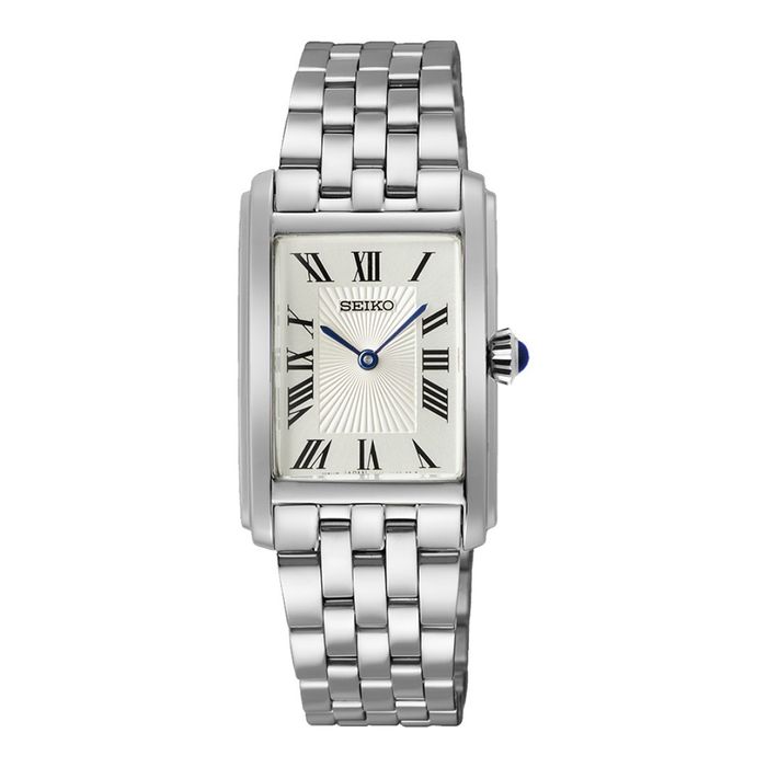 Relógio Seiko feminino com caixa e bracelete prateada em aço e mostrador retangular de fundo branco.