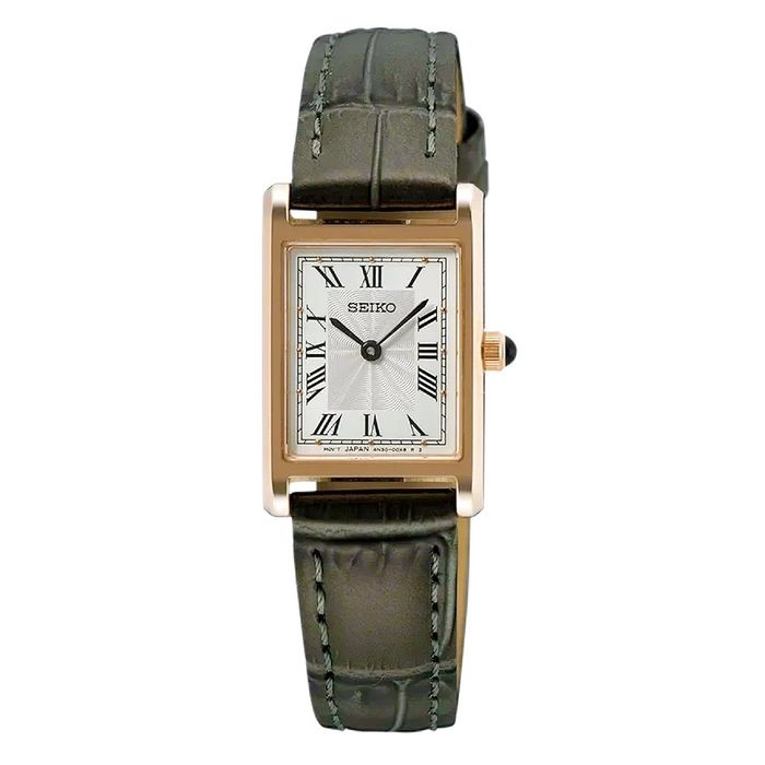 Relógio Seiko feminino, com caixa quadrada rose gold em aço e bracelete de pele de cor castanha.