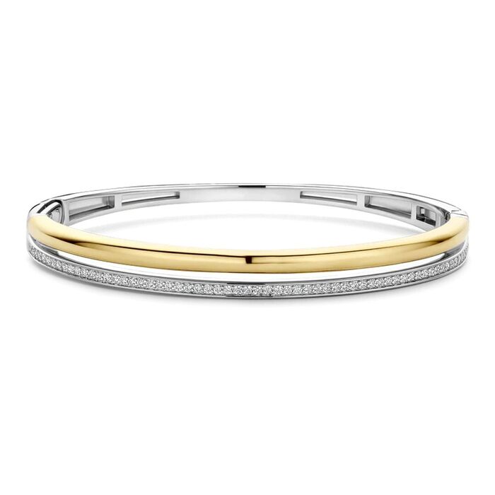 Pulseira estilo escrava em prata dourada e prateada, com dois aros e um deles cravado com zircónias