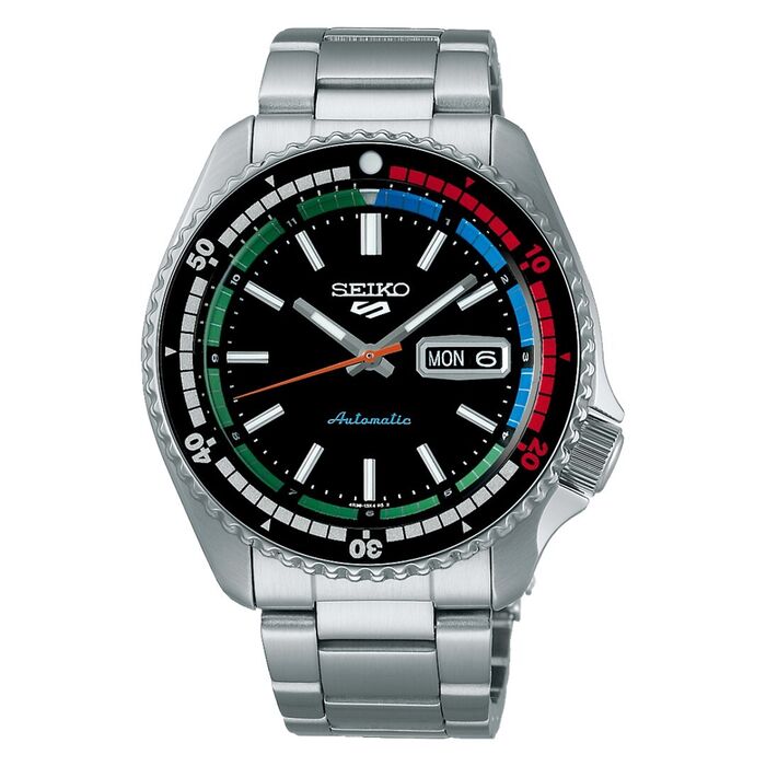 Relógio prateado Seiko com um mostrador preto com calendário e com vários indicadores coloridos.