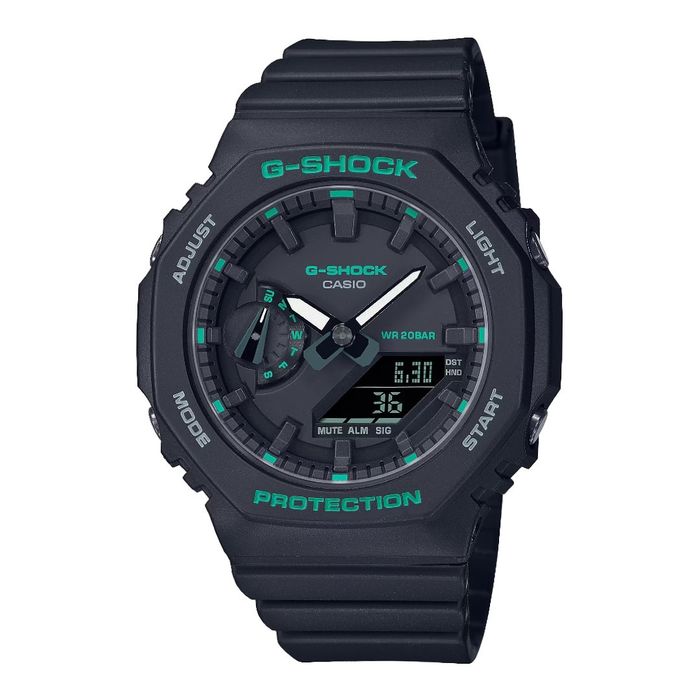 Relógio G-Shock preto com mostrador analógico-digital, detalhes verdes e bracelete preta.