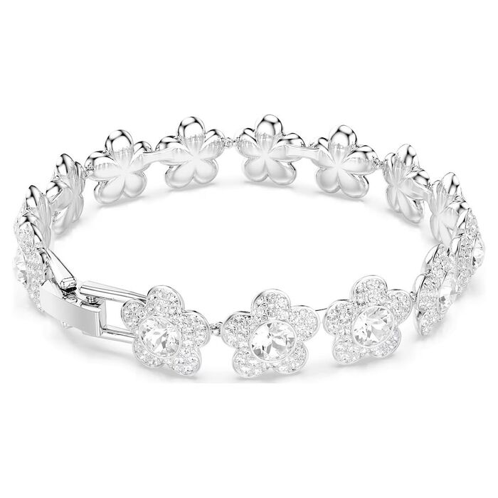 Vista traseira de pulseira prateada Swarovski com uma malha de flores com cristais transparentes.