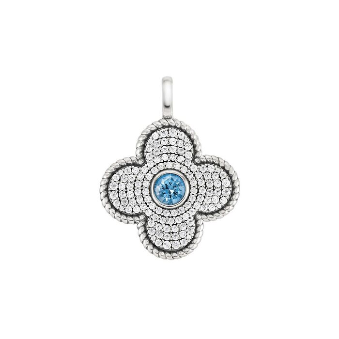 Medalha prateada feminina Tashi em forma floral com zircónias brancas e uma pedra azul no centro.