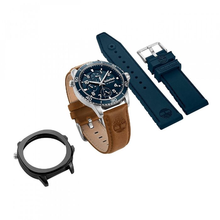 Relógio Timberland de bracelete castanha com uma bracelete azul e caixa preta ao lado.