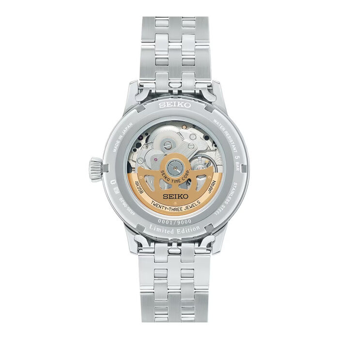 Relógio Seiko Presage de bracelete e caixa prateada em aço com tampa em vidro a mostrar o mecanismo.