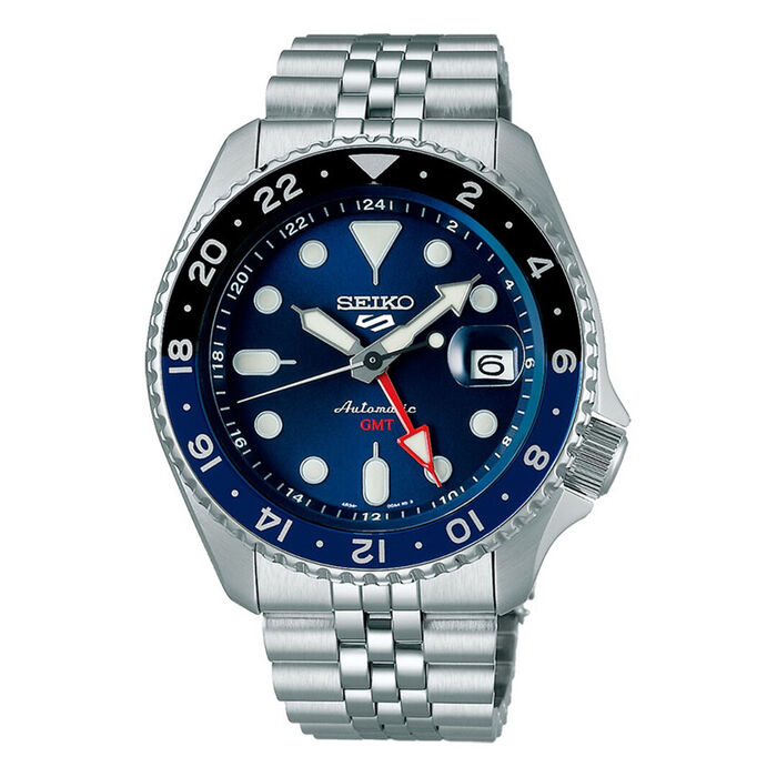 Relógio masculino Seiko 5 de bracelete e caixa em aço prateado, mostrador azul e calendário.