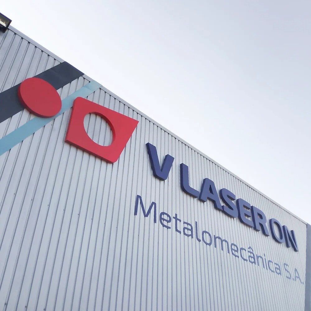 V Laser On factory facade with company logo in Portugal, showcasing industrial metal fabrication facilities