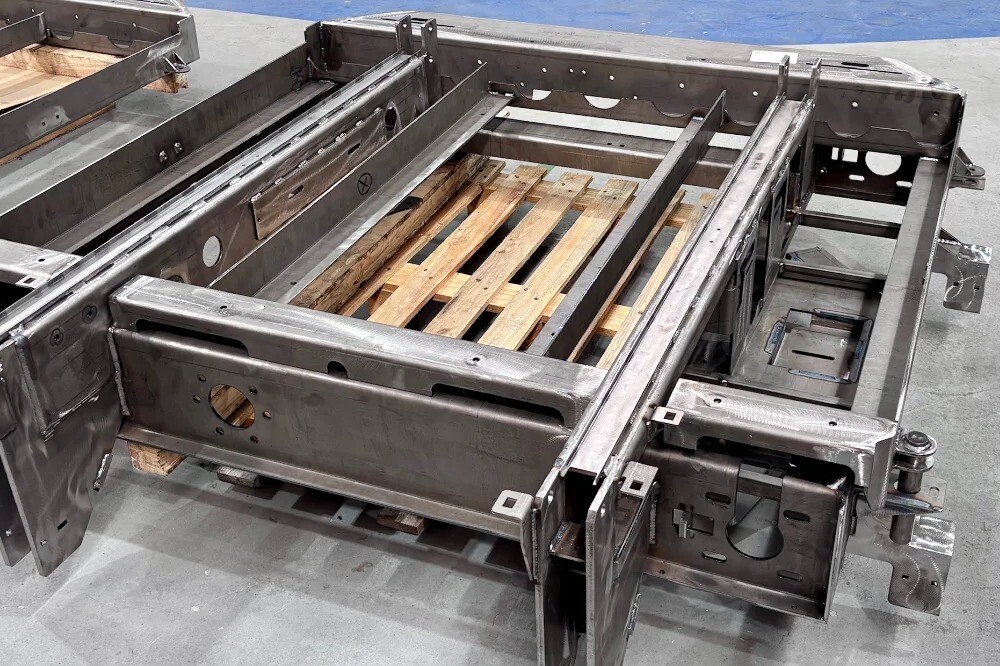 Complex welded steel chassis for intralogistics equipment manufacturer, showcasing precision metal fabrication and turnkey solutions by V Laser On in Portugal